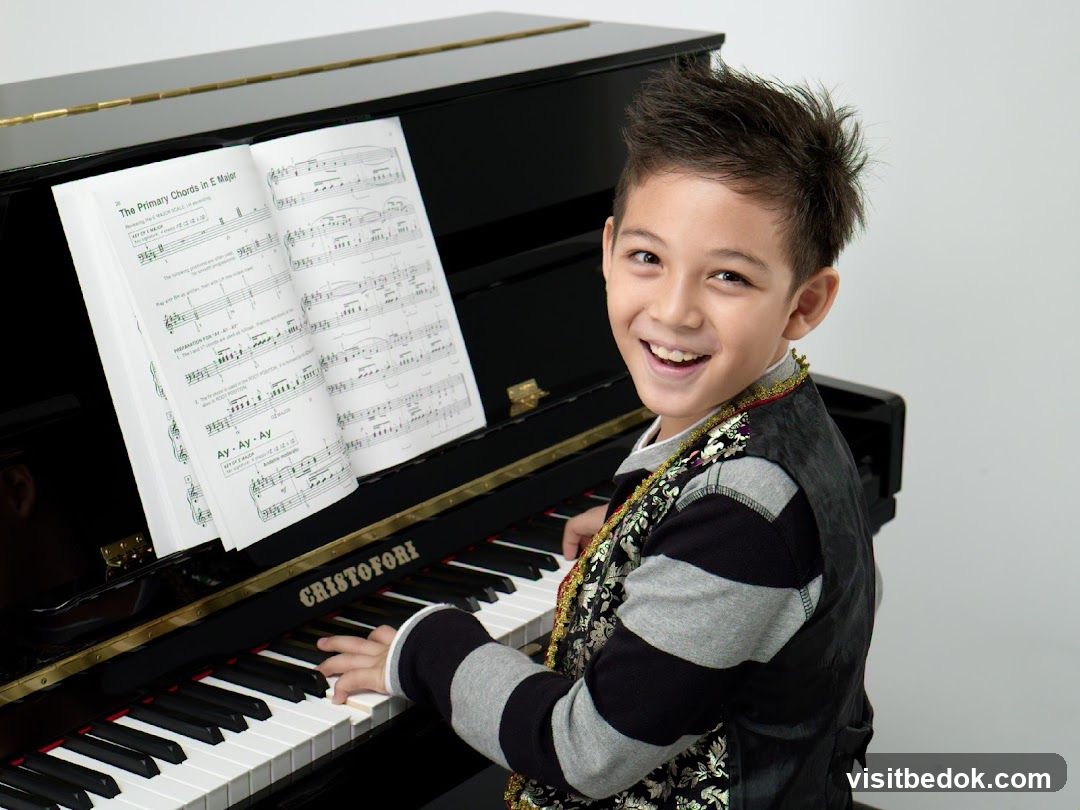Young boy playing piano