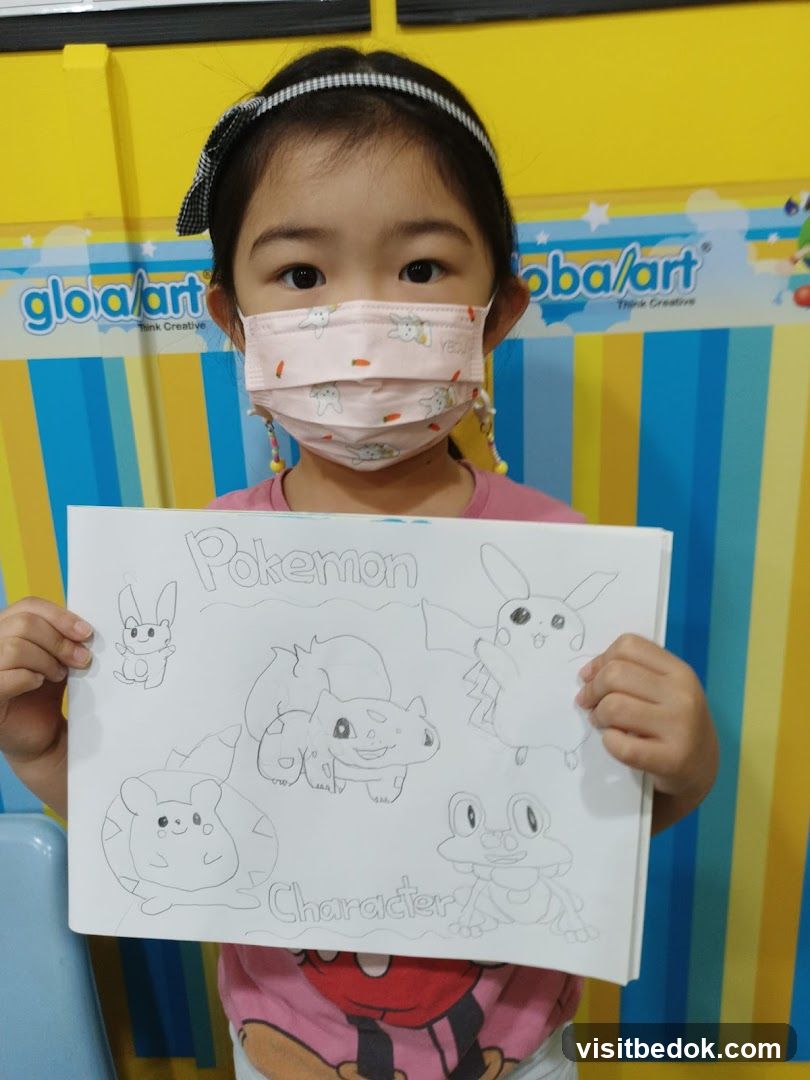Young Girl Holding Pokemon Drawing