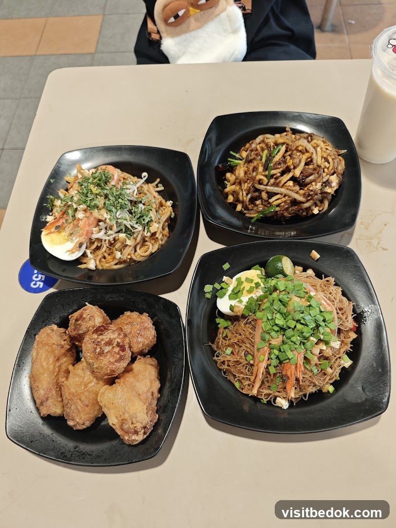Four plates of food and a drink