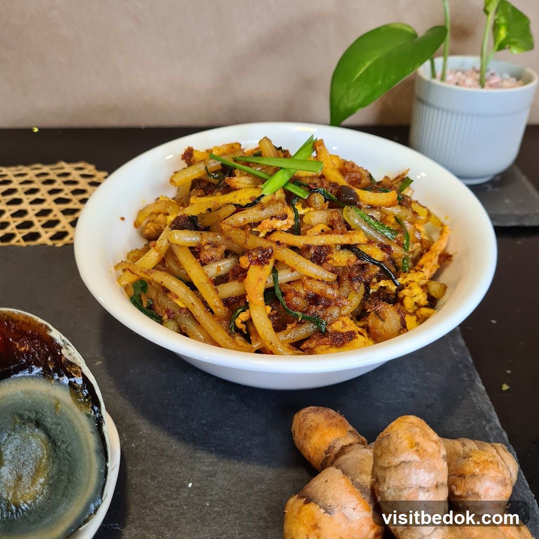 Stir-fried Noodles with Century Egg and Turmeric