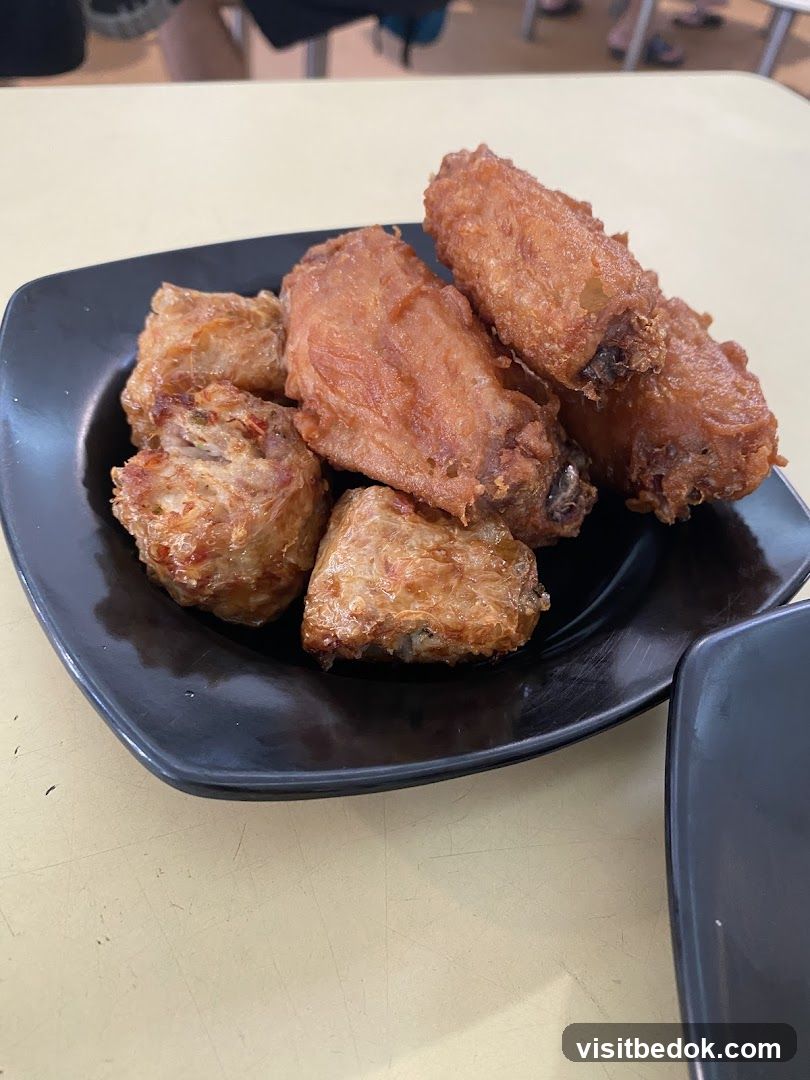 Fried Chicken Wings and Rolls