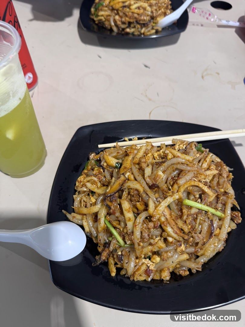 Stir-fried noodles with a drink