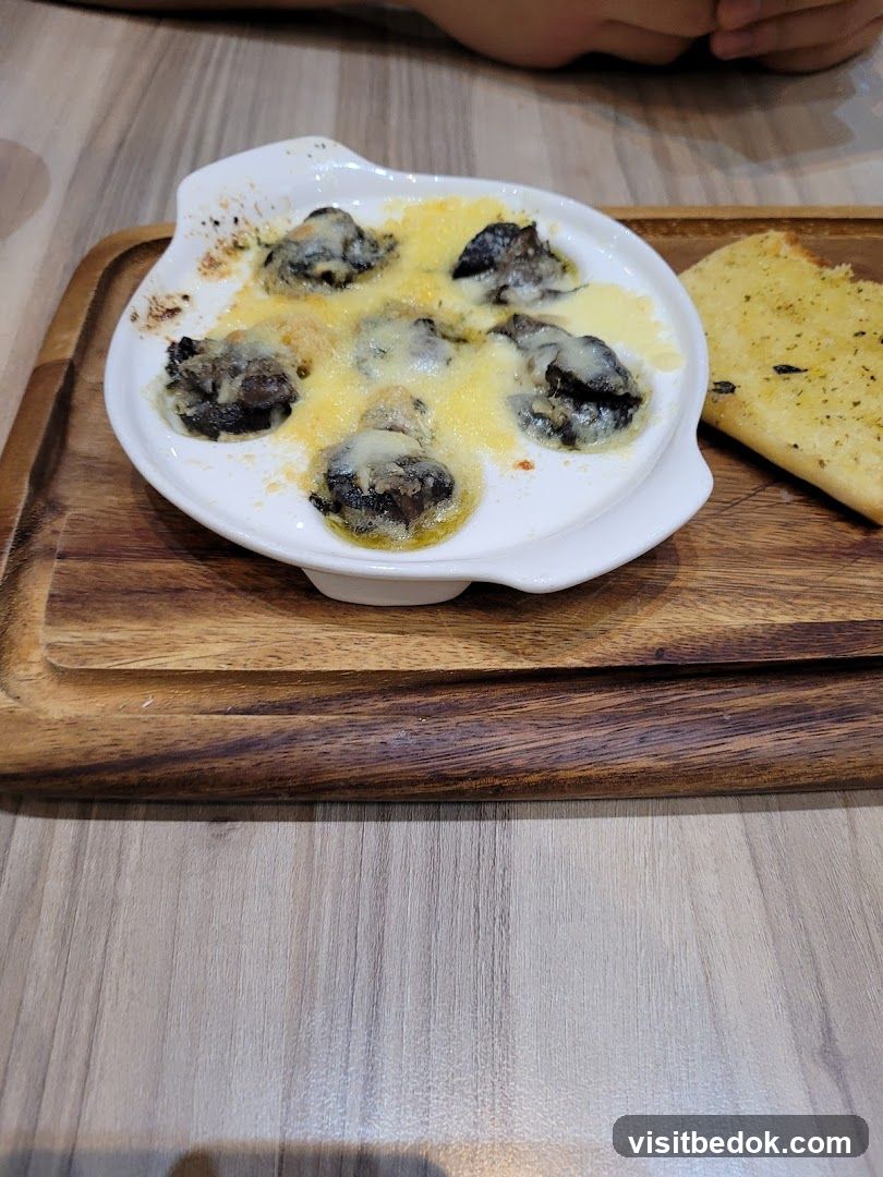 Escargots with Garlic Bread