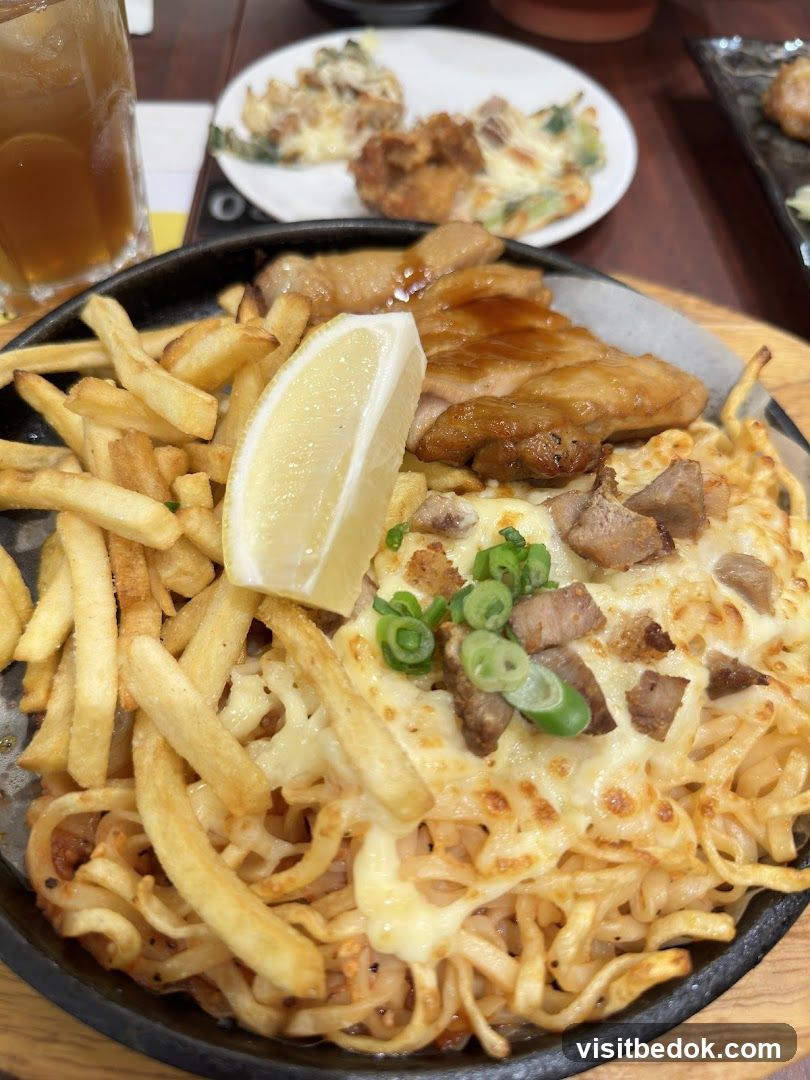 Sizzling Noodles with Chicken and Fries