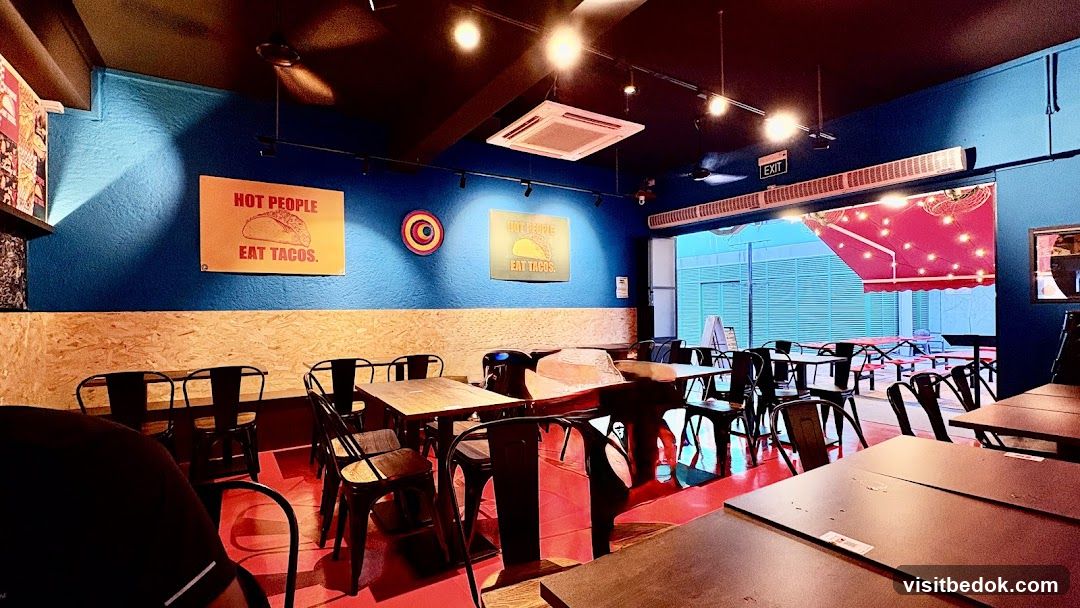 Restaurant Interior with Tacos Signage