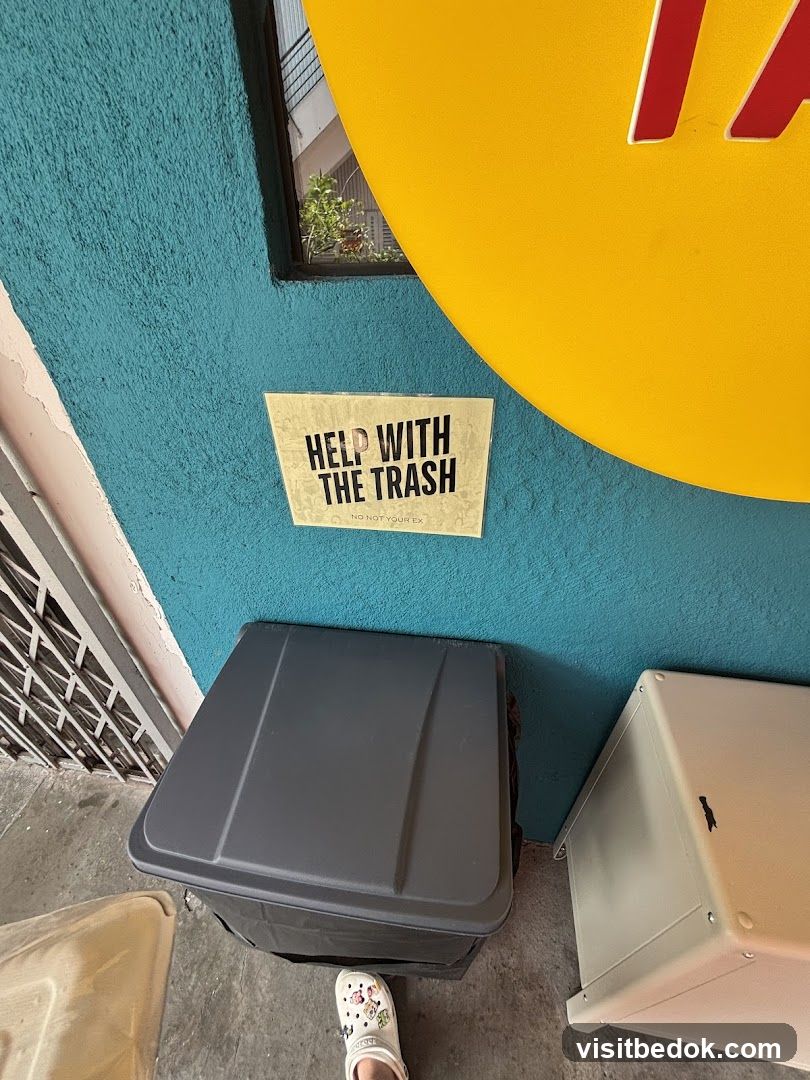 Trash cans with a sign