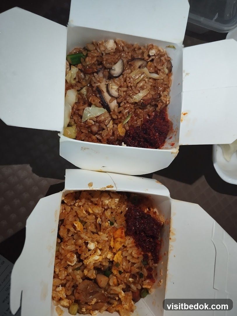 Two Takeout Boxes of Fried Rice