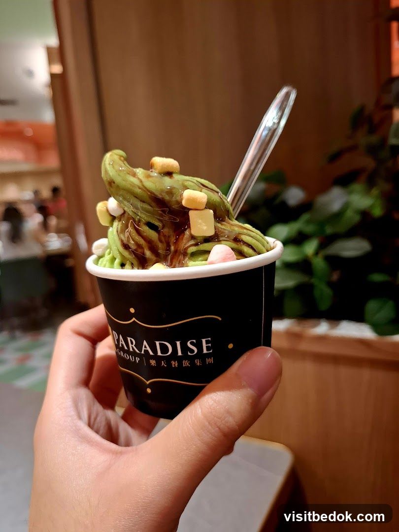 Green soft serve ice cream with toppings