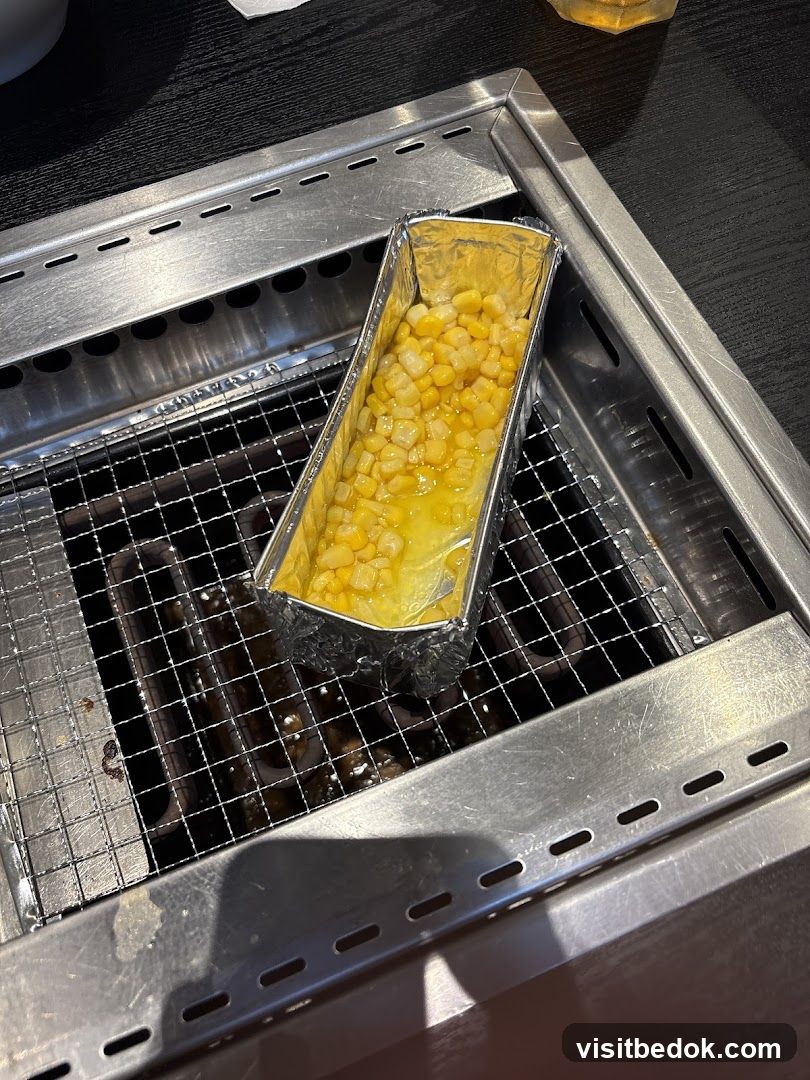 Corn in foil on grill