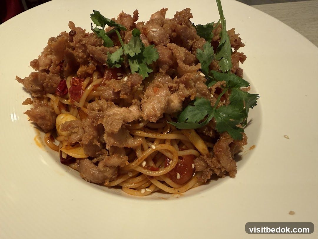 Spicy Noodles with Crispy Pork