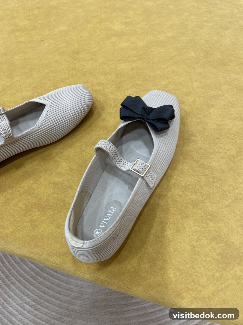 Beige Flats with Black Bows