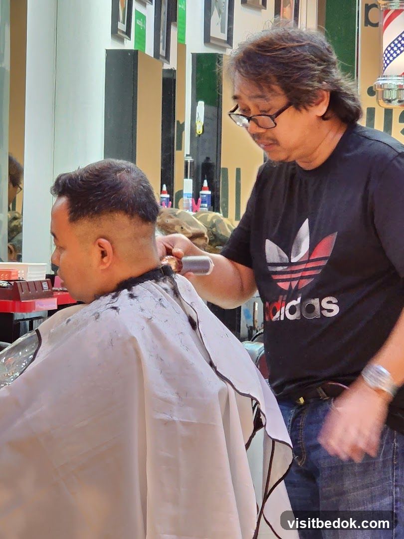 Barber giving a haircut