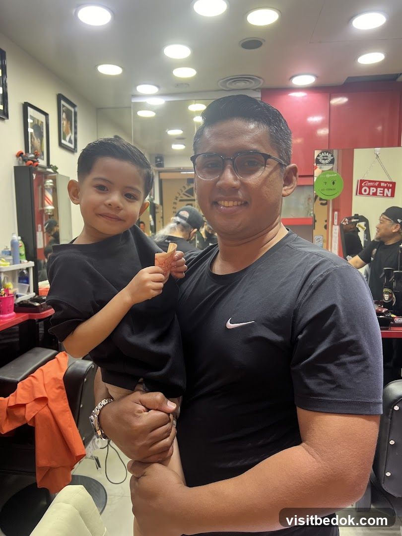 Man and child in barbershop