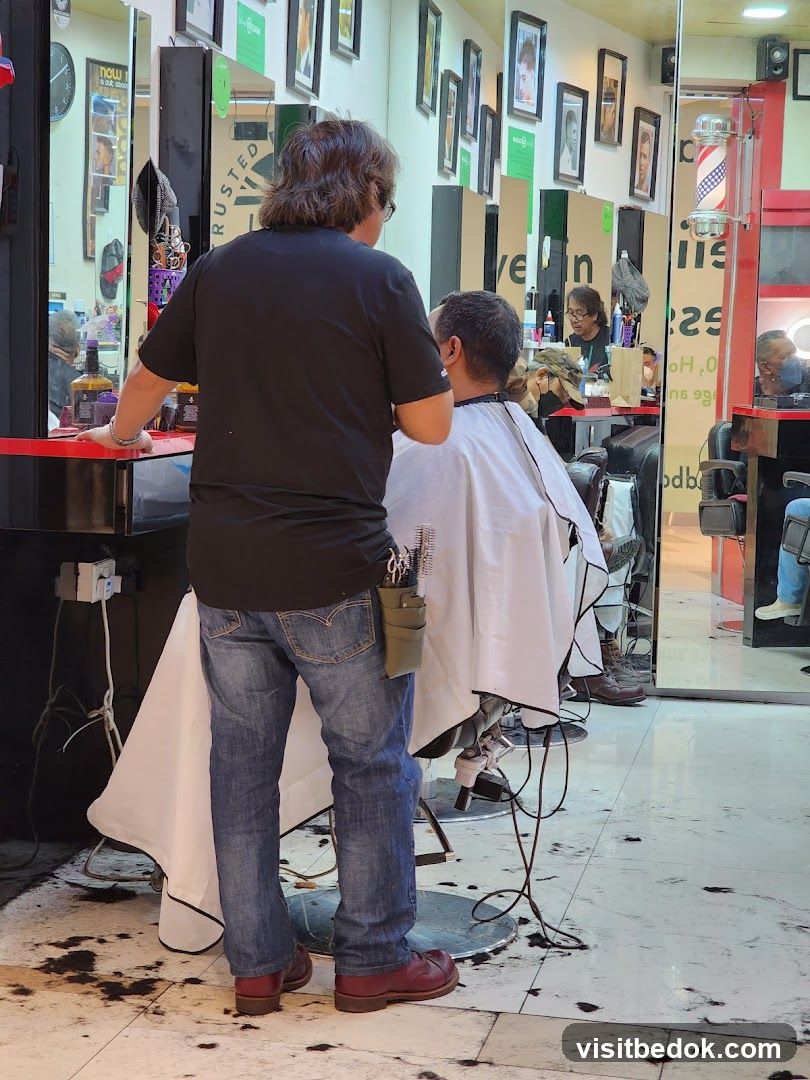 Barber cutting hair