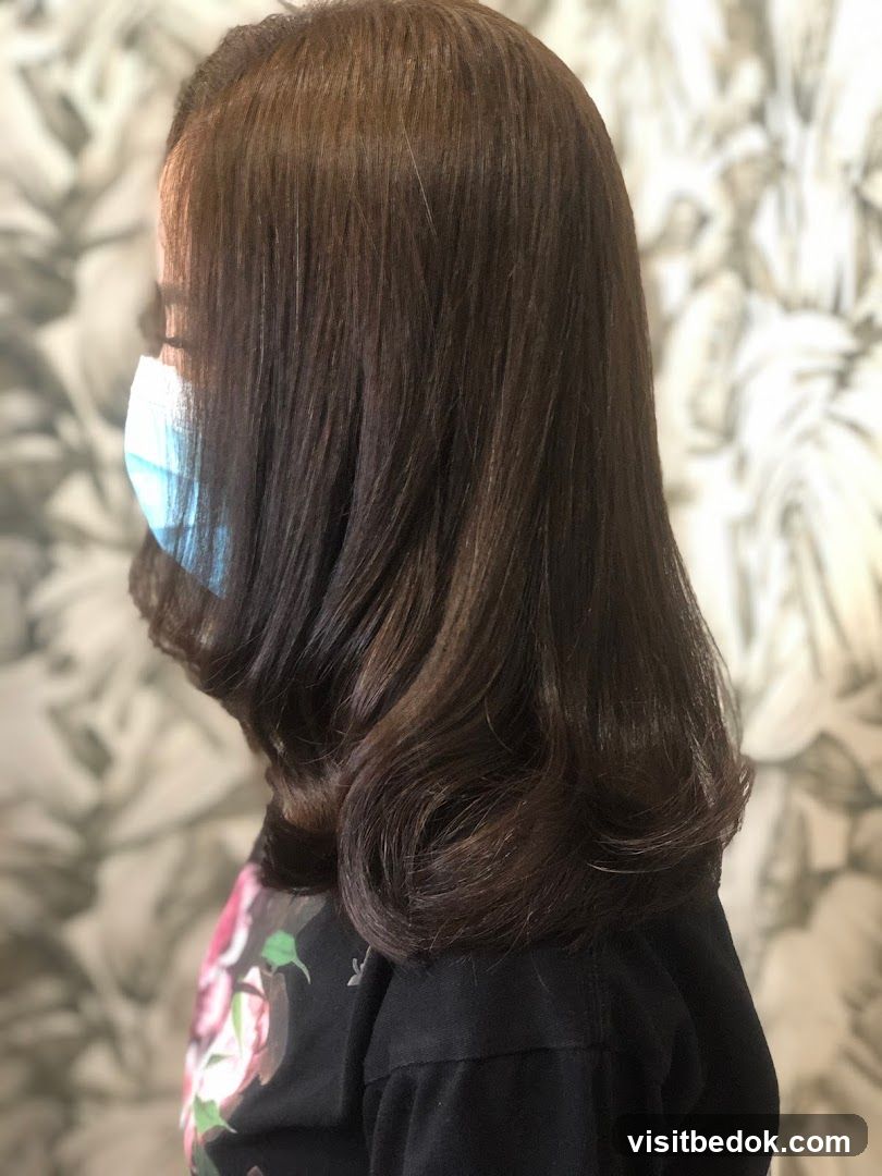 Woman with styled brown hair