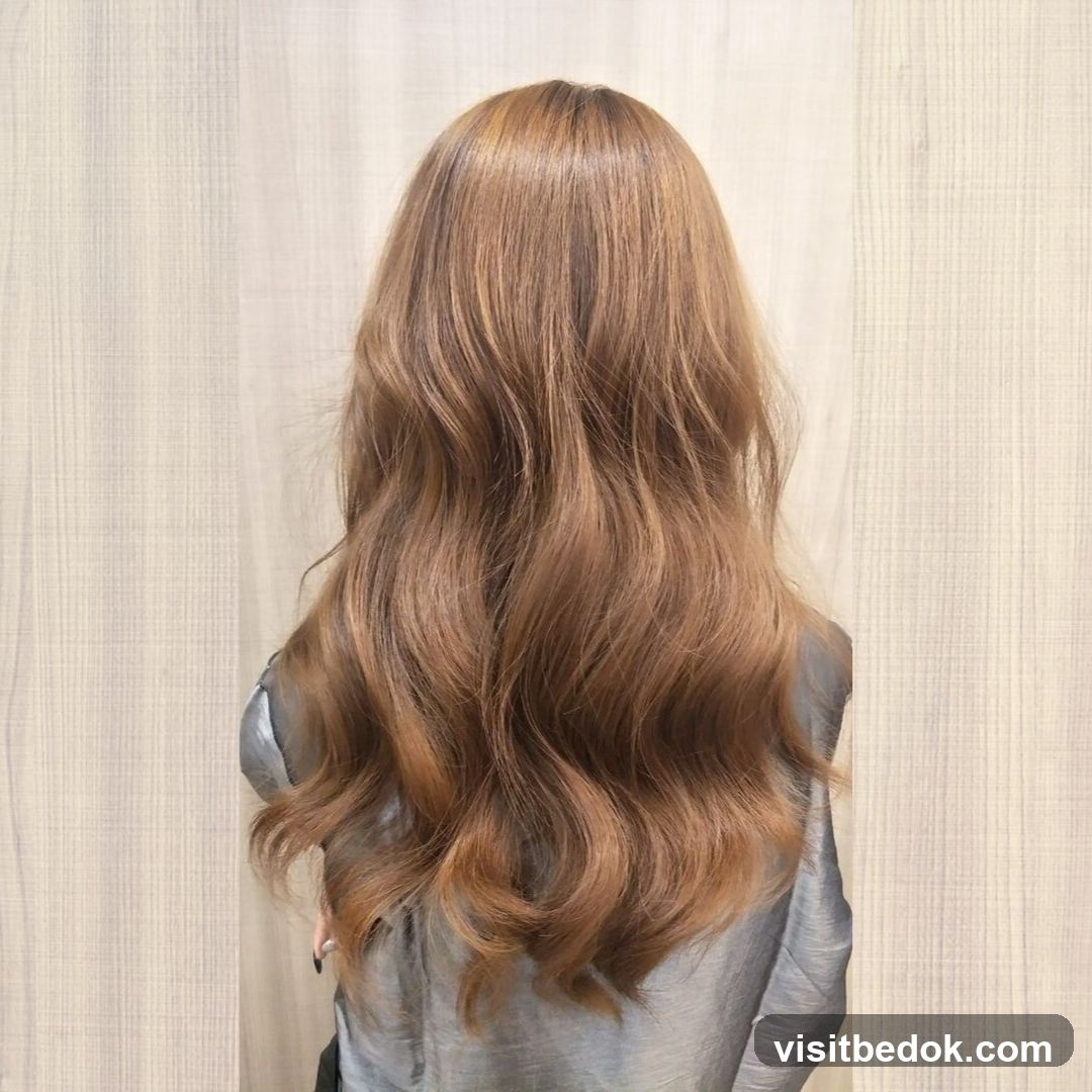 Woman's long wavy brown hair
