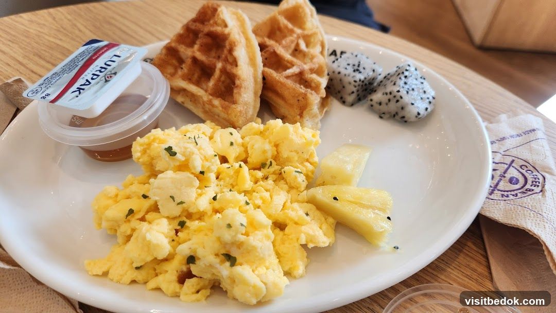Breakfast Plate with Waffles and Scrambled Eggs