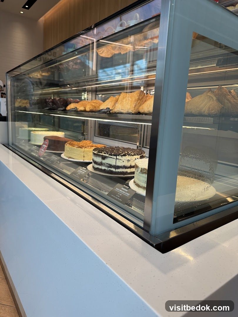 Cakes and Pastries in a Display Case