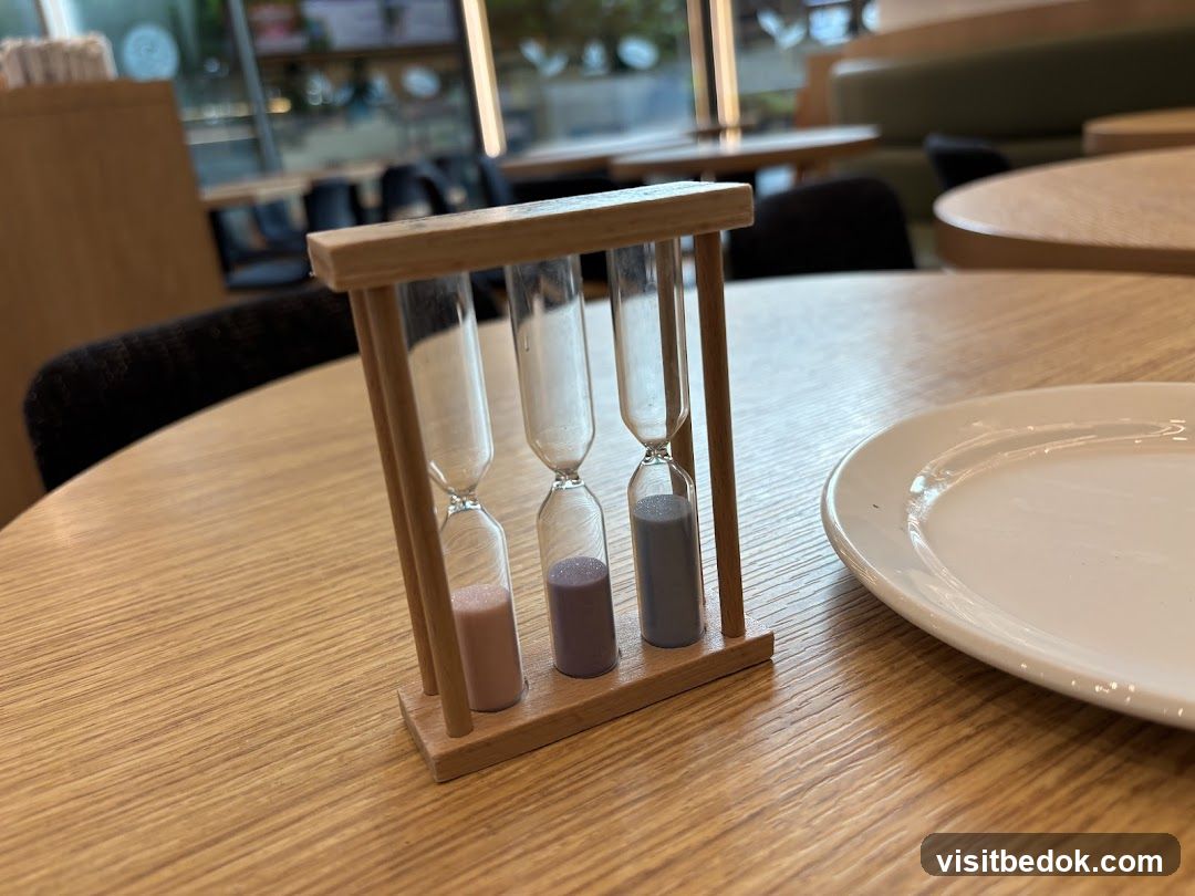 Triple hourglass timer on a table