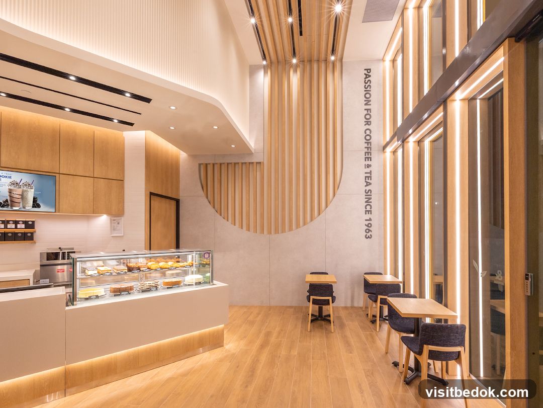 Modern Cafe Interior with Pastries and Seating