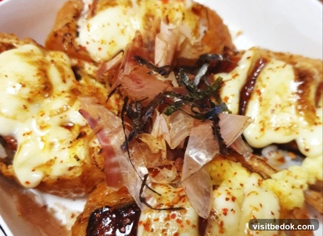 Takoyaki with cheese and bonito flakes
