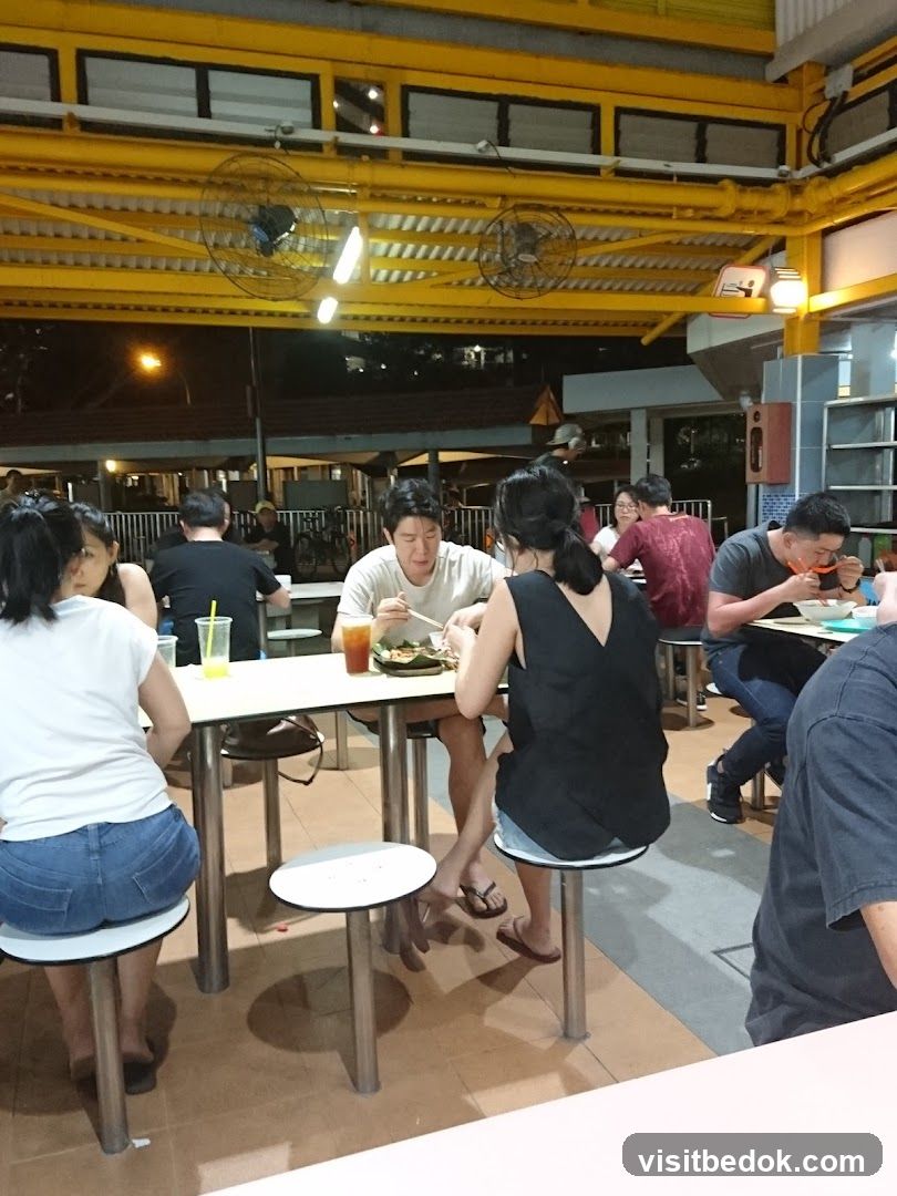 People eating at a food court