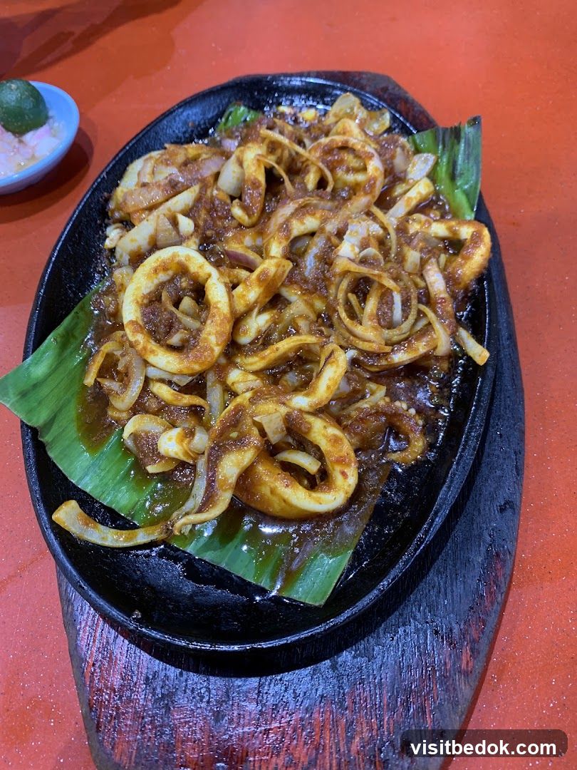 Sizzling Squid with Onions