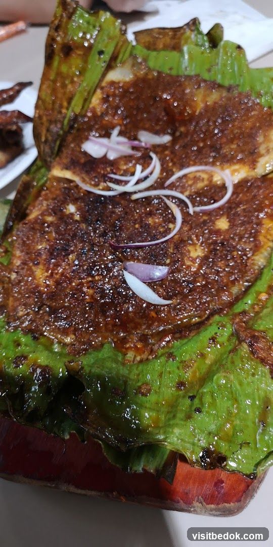 Grilled Fish with Sauce and Onions