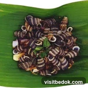 Snails on a banana leaf