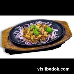 Sizzling Platter with Meat and Onions
