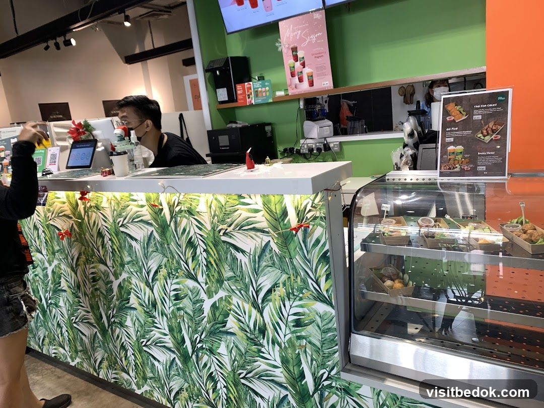 Counter with food display and staff