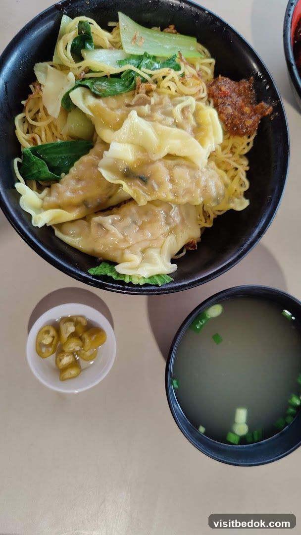 Noodle Dish with Dumplings and Soup