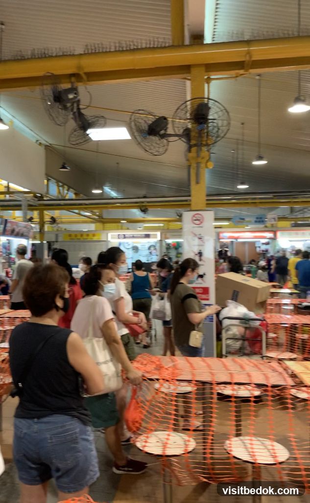 Food court with people and tables