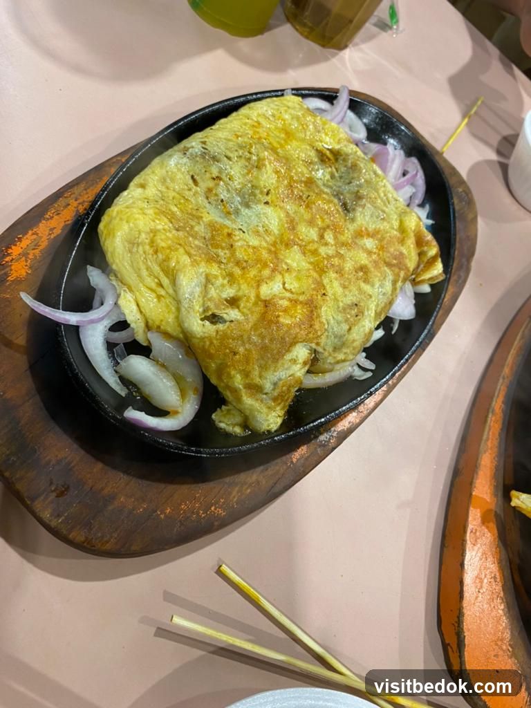 Sizzling Omelette with Onions