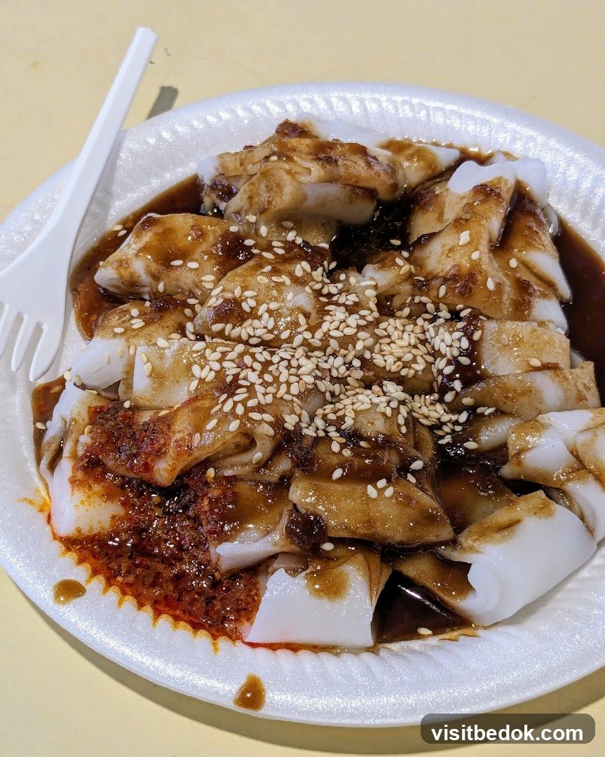 Cheung Fun with Sauce and Sesame Seeds