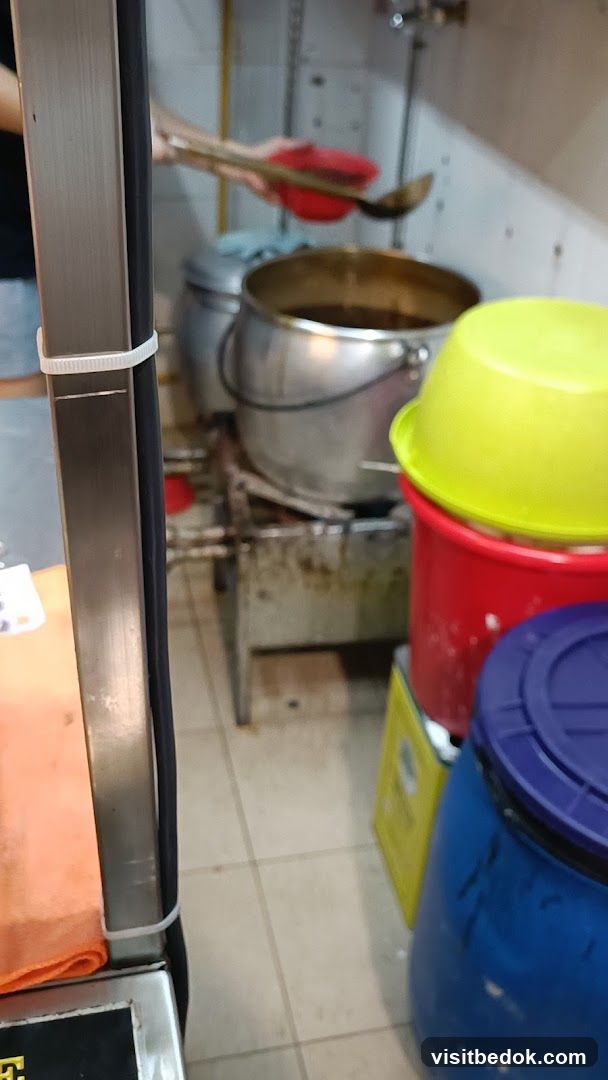 Kitchen Scene with Cooking Pots