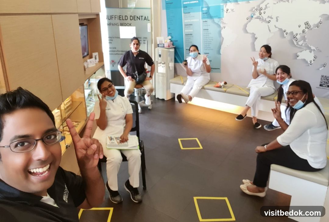 Dental clinic staff posing for a photo