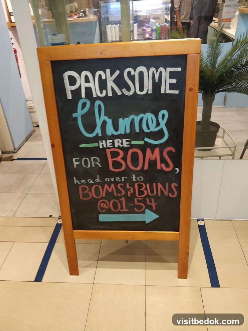 Churros and Bombs & Buns Sign