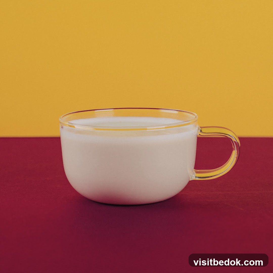 Glass cup of milk