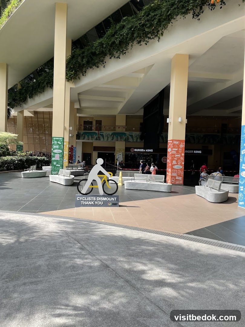 Outdoor plaza with seating and Burger King