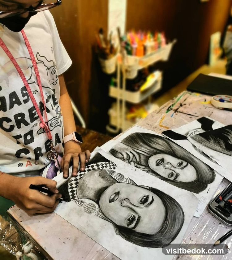 Artist drawing portraits