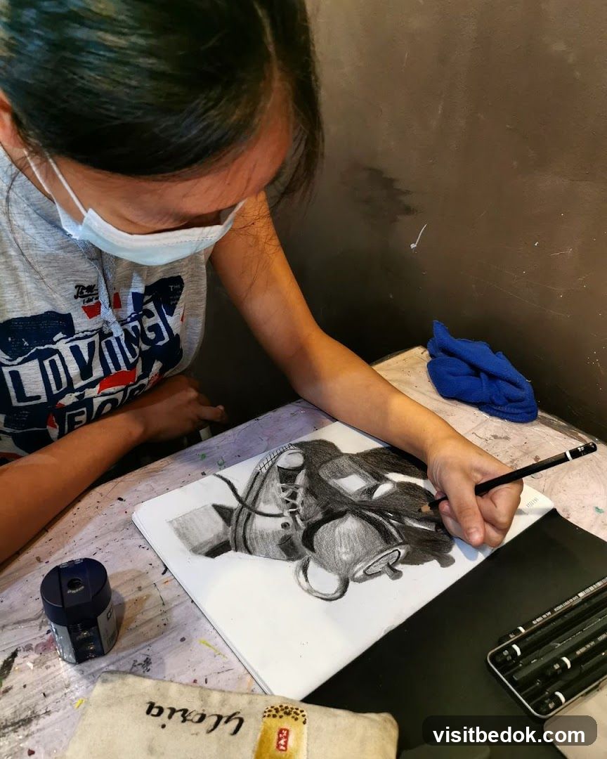 Person drawing a still life