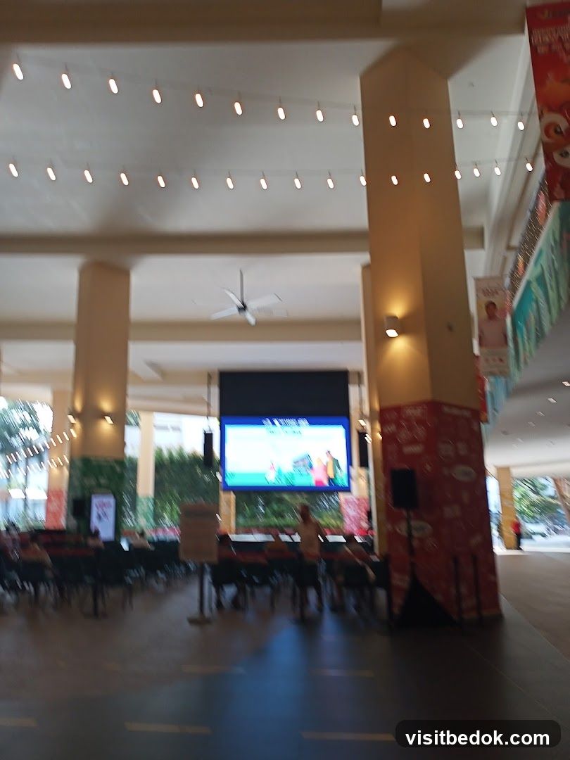 Indoor seating area with large screen