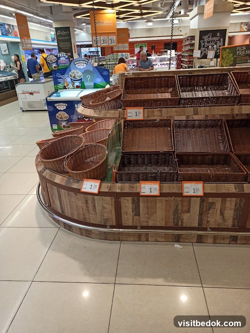 Supermarket aisle with empty baskets