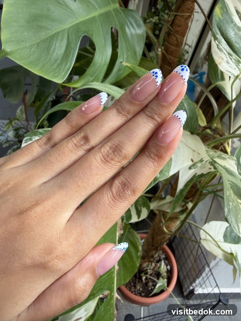 French Manicure with Blue Dots