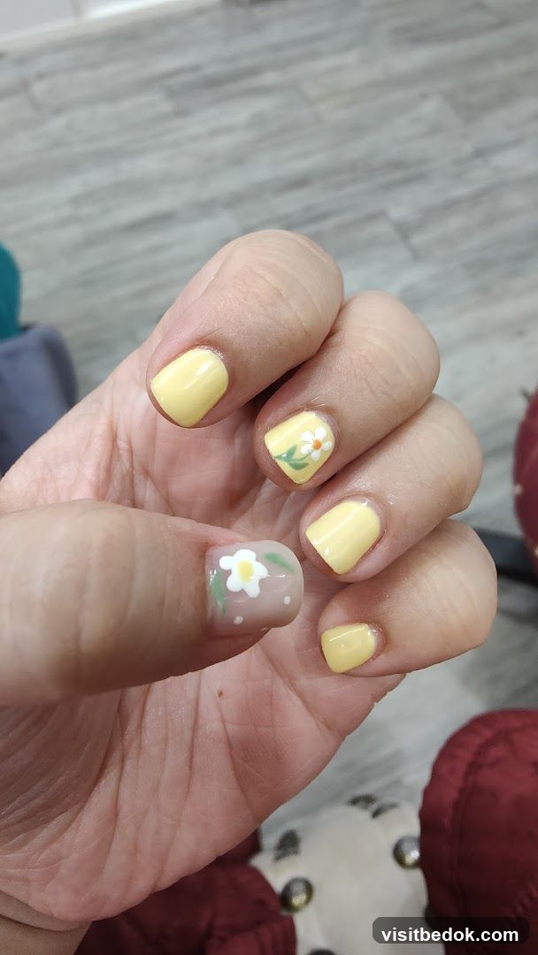Yellow Nails with Floral Design