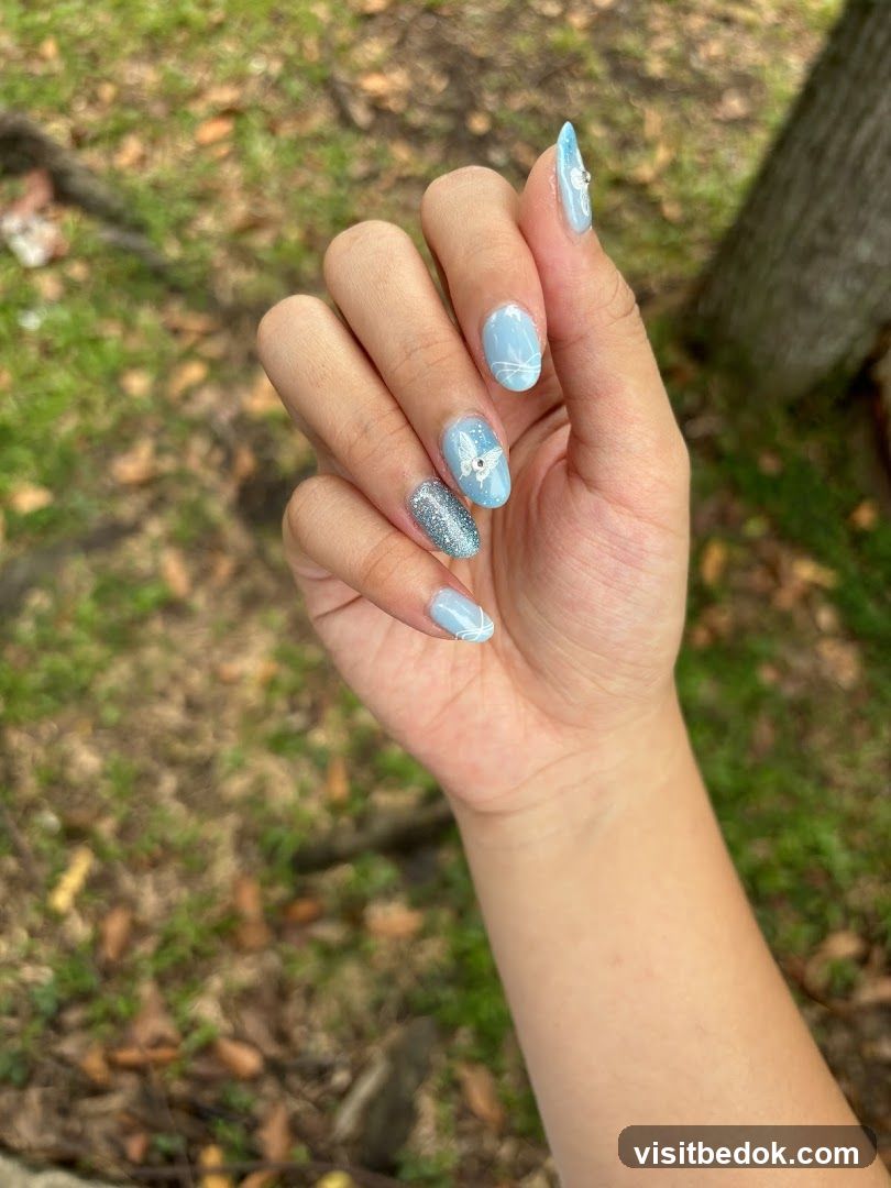 Light Blue Butterfly Nails
