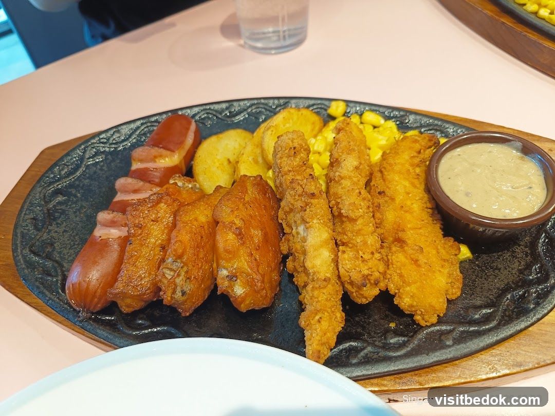Sizzling Platter with Sausage, Wings, and Chicken Strips