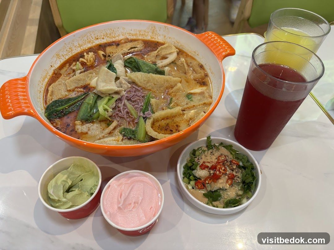 Noodle Soup Meal with Sides and Drinks