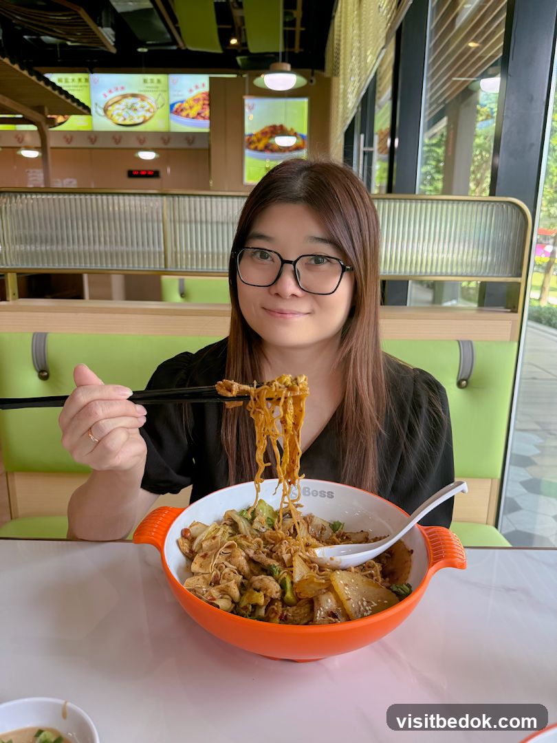 Woman eating noodles